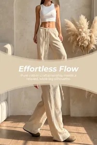 Beige pure cotton wide-leg trousers shown in a relaxed lifestyle setting