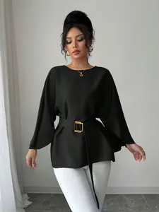 Detailed view of French retro black blouse featuring elegant flare sleeves and belt.