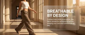 Close-up of breathable pure cotton wide-leg pants on a walking model in warm light