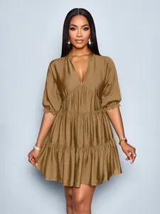 Elegant deep V-neck brown puff sleeve pleated mini dress with tiered skirt detail
