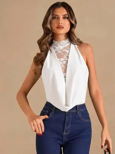Detailed view of a stylish white lace halter neck bodysuit with a draped cowl front design
