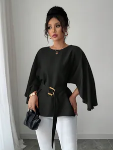 Elegant French retro black top featuring flared sleeves and a gold buckle belt detail
