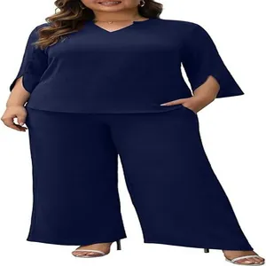 Full view detail of navy blue two-piece set featuring V-neck top and wide-leg trousers