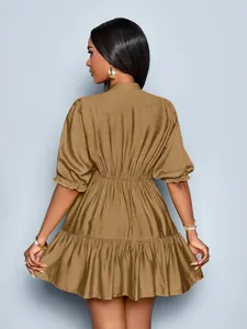 Elegant back view of a brown puff sleeve pleated mini dress with ruffled hem detail