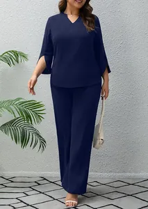 Women's navy blue casual two-piece outfit featuring v-neck top and matching wide-leg trousers