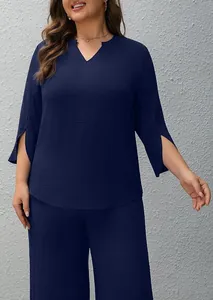 Close-up of navy blue two-piece leisure set featuring a V-neck tunic and wide-leg pants