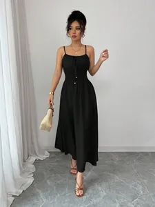 Elegant long black sleeveless smocked waist cami dress with tie-up neckline detail
