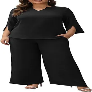 Elegant black two-piece set featuring a short sleeve V-neck top and wide-leg trousers