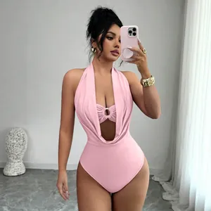 Pink deep V halter neck bodysuit featuring a hollow-out ring detail and slim-fit design.