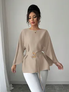 Elegant beige French retro blouse featuring flare sleeves and a belt with gold buckle