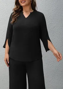 Elegant black two-piece set featuring V-neck slit sleeve top and wide-leg trousers