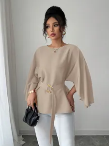 Elegant French retro beige top with wide bell sleeves and matching gold buckle belt