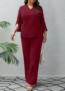 Casual burgundy two-piece suit featuring V-neck top and matching wide-leg trousers