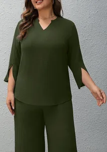 Detailed view of dark olive green two-piece set featuring notched V-neck and split sleeves