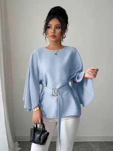 Elegant French vintage light blue bell sleeve blouse with a matching belt detail for women
