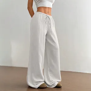 Minimalist white pure cotton loose wide leg floor-length trousers for casual wear