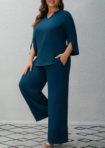 Elegant teal two-piece set featuring a v-neck tunic top and matching wide-leg trousers.