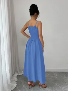 Back view detail of a light blue sleeveless smocked waist cami maxi dress for women