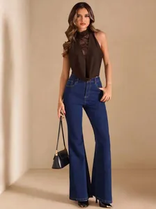 Brown halter neck lace mesh cowl neck bodysuit with blue flare jeans