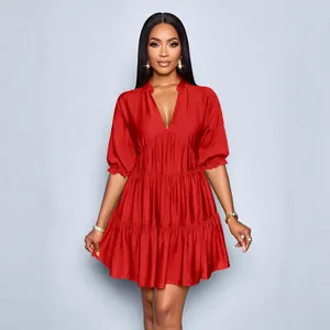 Elegant women's red tiered puff sleeve mini dress with a stylish deep V-neck design