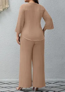 Back view of a solid beige two-piece set for women with textured fabric and wide-leg pants