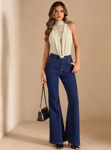 Elegant halter neck bodysuit with lace mesh detail and flare jeans outfit