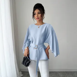 Elegant French retro blue blouse with flare sleeves and belt for a slim silhouette