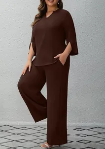Elegant dark brown two-piece set with split sleeves and wide-leg pants shown on model