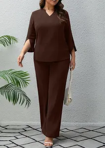 Detail view of women's dark brown two-piece set featuring V-neck top and wide-leg trousers.