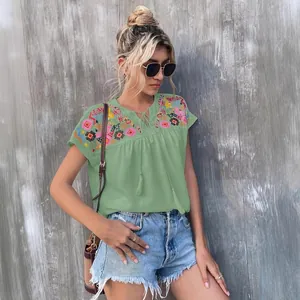 Sage green bohemian embroidered summer blouse with tassel tie neck and batwing sleeves