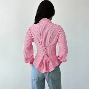 Women's pink striped long sleeve shirt featuring a trendy lace-up corset back design