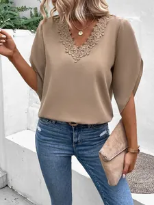 Chic beige V-neck blouse with floral lace trim and elegant petal sleeves for summer