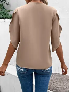 Rear view of a stylish solid khaki blouse featuring elegant ruffle sleeves and a loose fit