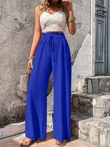 High waist blue bubble crepe wide-leg pants with elastic drawstring waist detail