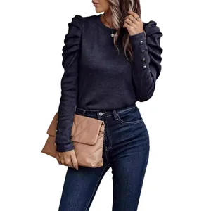 Elegant slim fit puff sleeve knit top with decorative cuff buttons in a dark blue finish