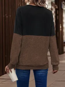 Back view of women's color-block casual top with black and heather brown panels