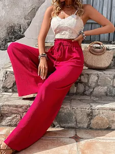Trendy vibrant pink bubble crepe wide-leg pants for women perfect for summer vacations
