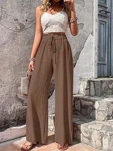 Stylish high-waisted bubble crepe wide leg pants with adjustable drawstring in brown