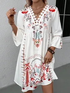 Stylish casual summer boho V-neck dress with lace patchwork and floral patterns