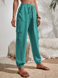 Pantalones cargo informales turquesa para mujer con cintura elástica y bolsillos