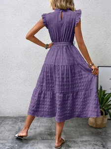 Back view of a purple flutter sleeve ruffled midi dress with a belt and textured fabric