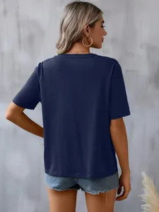 Detailed back view of a casual women's navy blue short-sleeve T-shirt with a relaxed fit