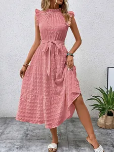 Detailed view of pink textured ruffle sleeve midi dress with waist tie and tiered skirt