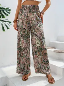Vista dettagliata di pantaloni a gamba larga con stampa paisley e vita alta elastica