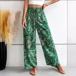 Eleganti pantaloni a gamba larga con stampa paisley verde e vita elastica con coulisse per l'estate