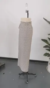 Bohemian style geometric print wide leg skort pants with side slit on mannequin