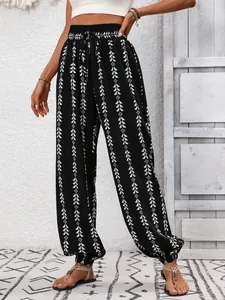 Women's high-waisted geometric print harem pants with elastic cuffs, casual summer.