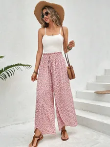 Bohemian style pink floral print wide-leg skirt pants with high side slits and camisole