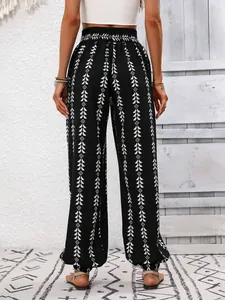 Women's boho harem pants with geometric tribal print showing back detail view