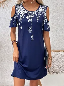 Navy blue cold-shoulder summer dress with white floral print and round U-neck design